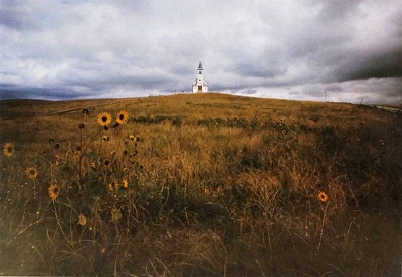 Elliott Erwitt
The Church at Wounded Knee, S.D., 1970
Original Dye Transfer
24 x 30 in. (61 x 76.2 cm)
UniqueHighlights the wooden church that was at the scene of Custer's last stand, burned down in 1973