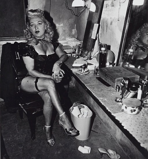 Diane Arbus
Burlesque comedienne in her dressing room, Atlantic City, NJ., 1963
Gelatin silver print (black & white)
7 1/4 x 6 3/4 in. (18.4 x 17.1 cm)
This work was printed by Diane Arbus