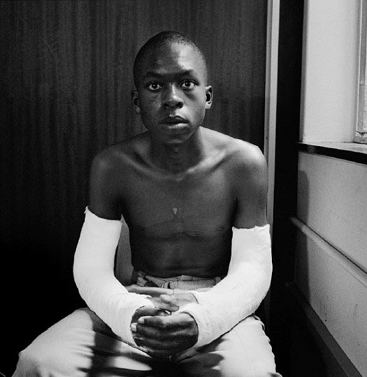 David Goldblatt
Fifteen-year old Lawrence Matjee after his assault and detention by the Security Police, Khotso House, de Villiers Street (2_31686), 1985
Gelatin silver print (black & white)
15 11/16 x 15 11/16 in. (40 x 40 cm)
Edition 4/8