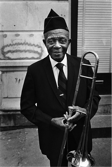 Dawoud Bey
A Trombonist from the 369th Regiment Marching Band, Harlem, NY, 1977
Gelatin silver print (black & white)
11 15/16 x 8 1/16 in. (30.3 x 20.5 cm)
Edition 2/10 + 2 APs From ""Harlem"" series